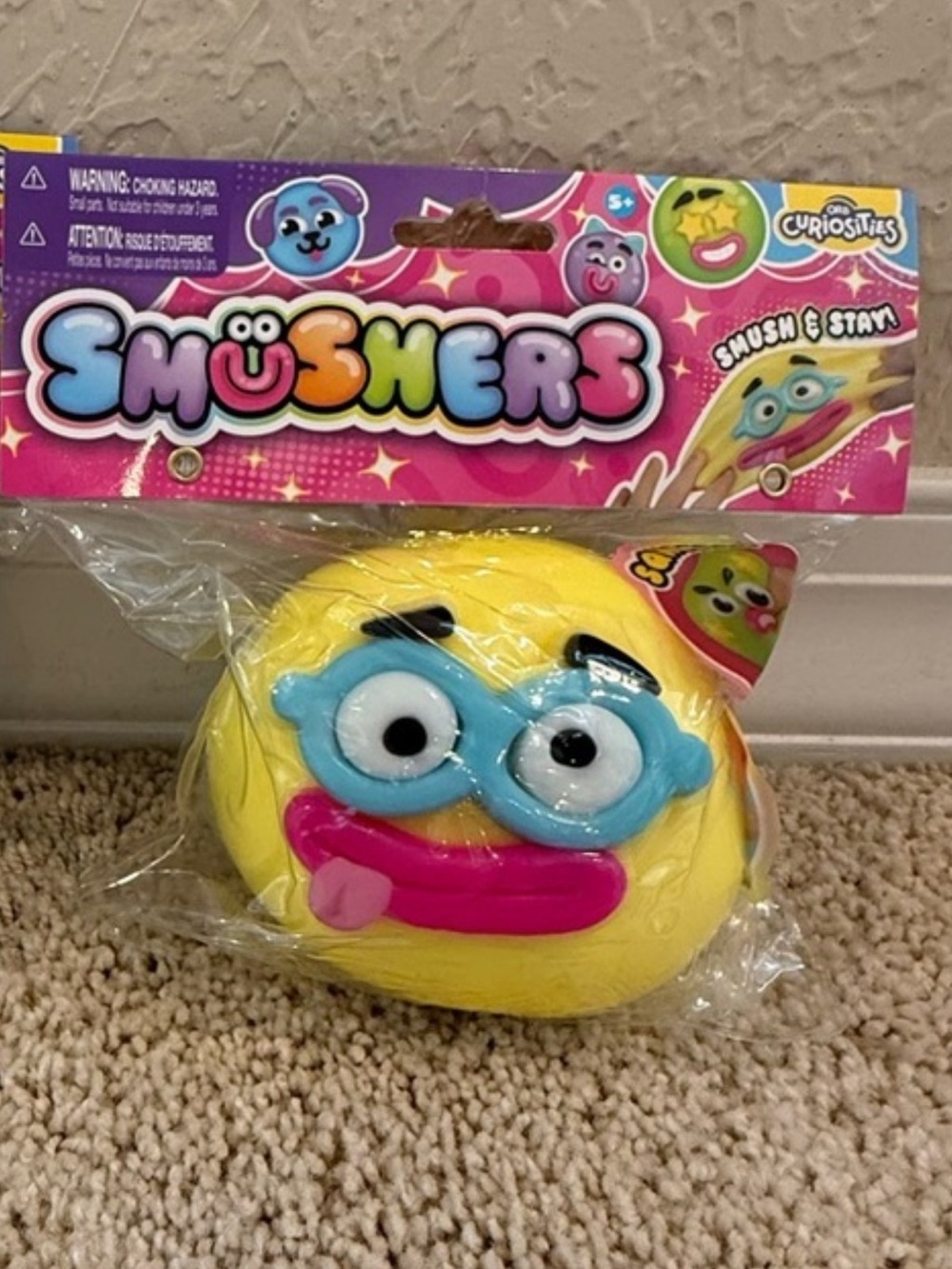 Smushers Yellow Squishy Toy with Blue Glasses